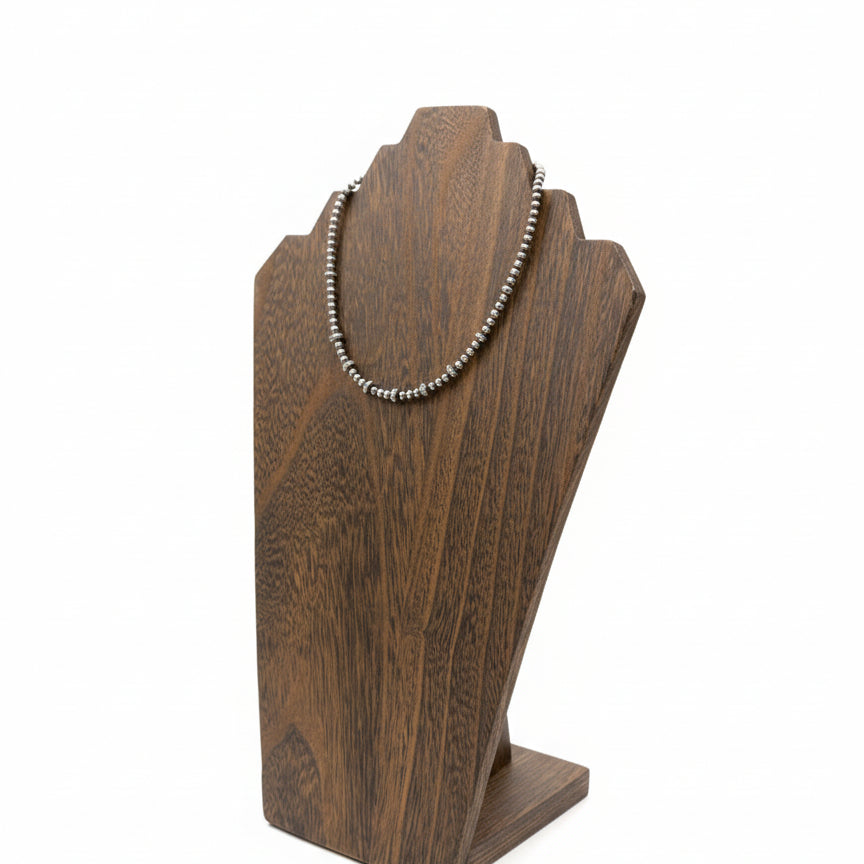 Saucer and Pearl Necklace